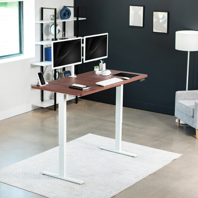 Sturdy ergonomic sit or stand active desk workstation with adjustable height using smart control panel.