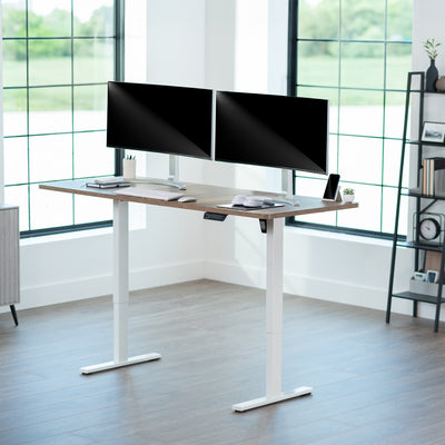 Large sturdy sit or stand modern desk with electric height adjustment options.