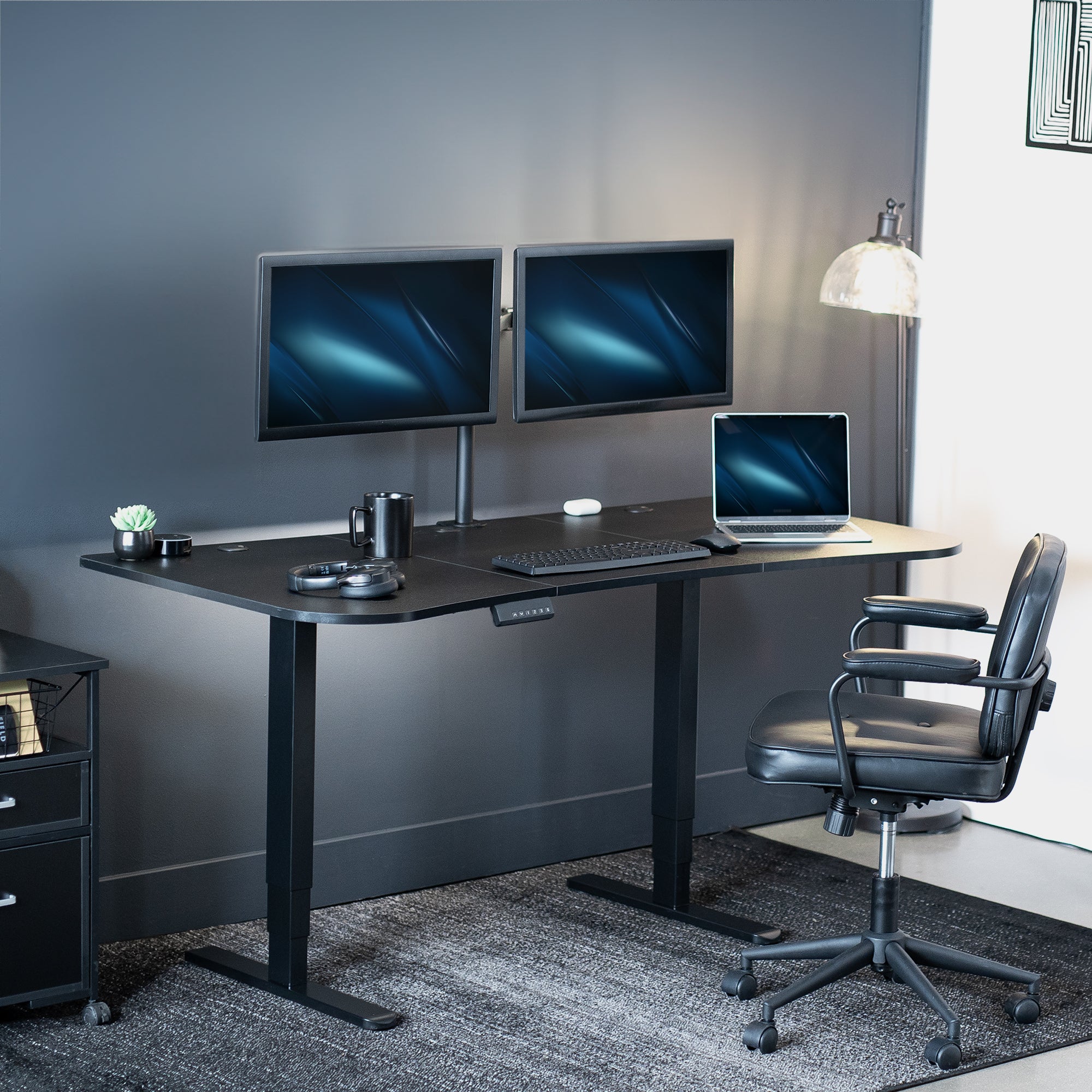 Large standing desk featuring smooth height adjustment, powerful dual motors, and a simple push-button controller featuring memory presets.