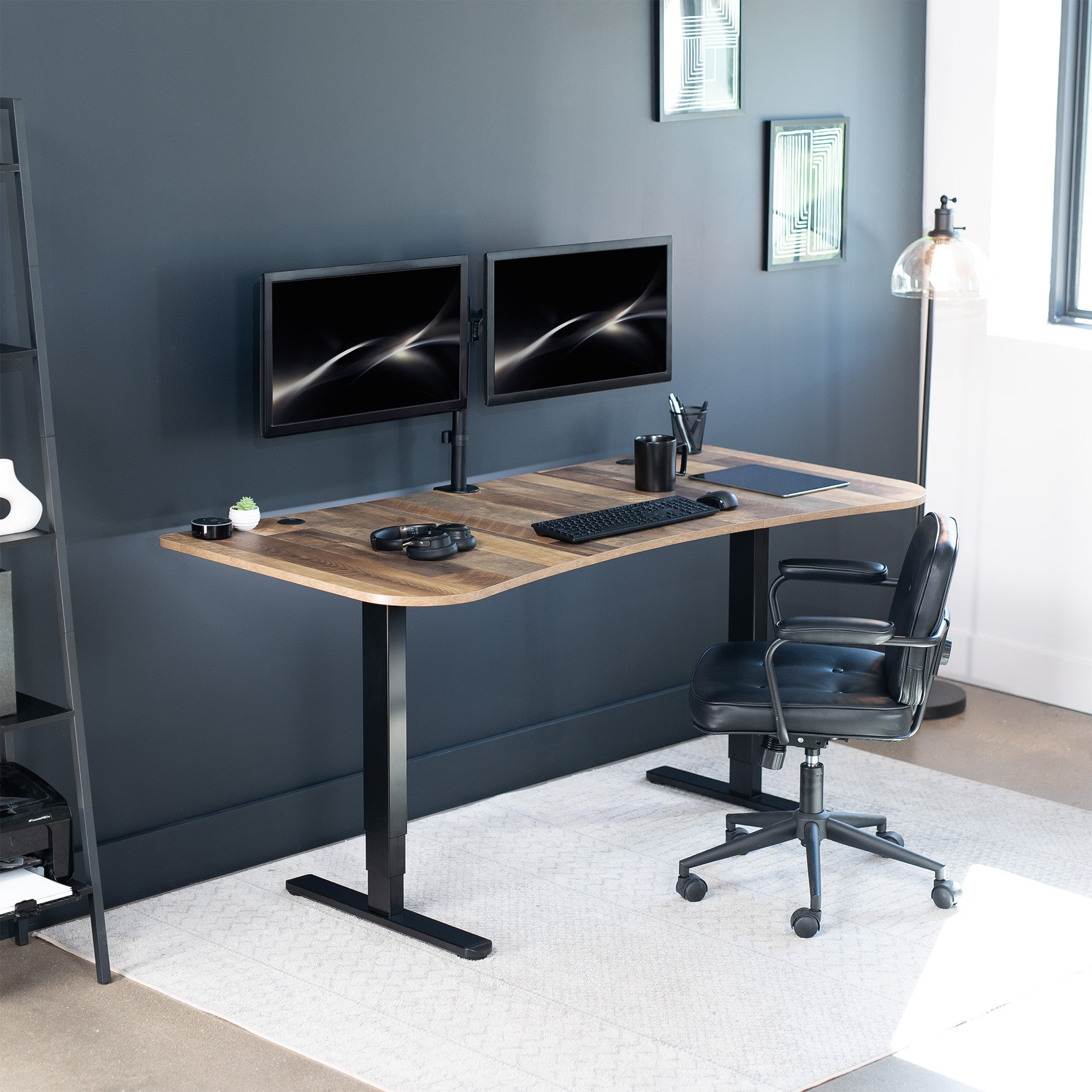 Large standing desk featuring smooth height adjustment, powerful dual motors, and a simple push-button controller featuring memory presets.