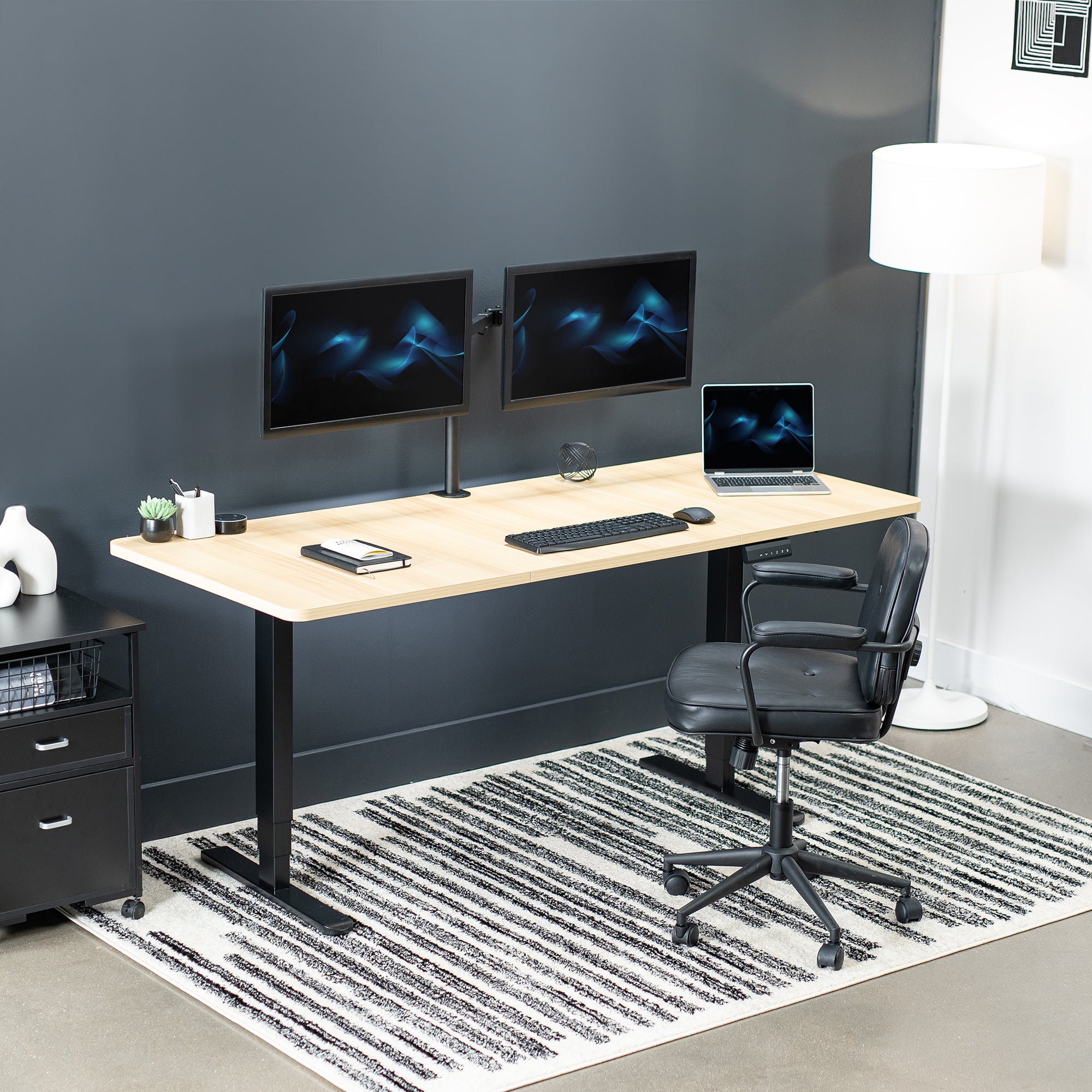 Large sturdy sit or stand active workstation with adjustable height using a memory control panel.