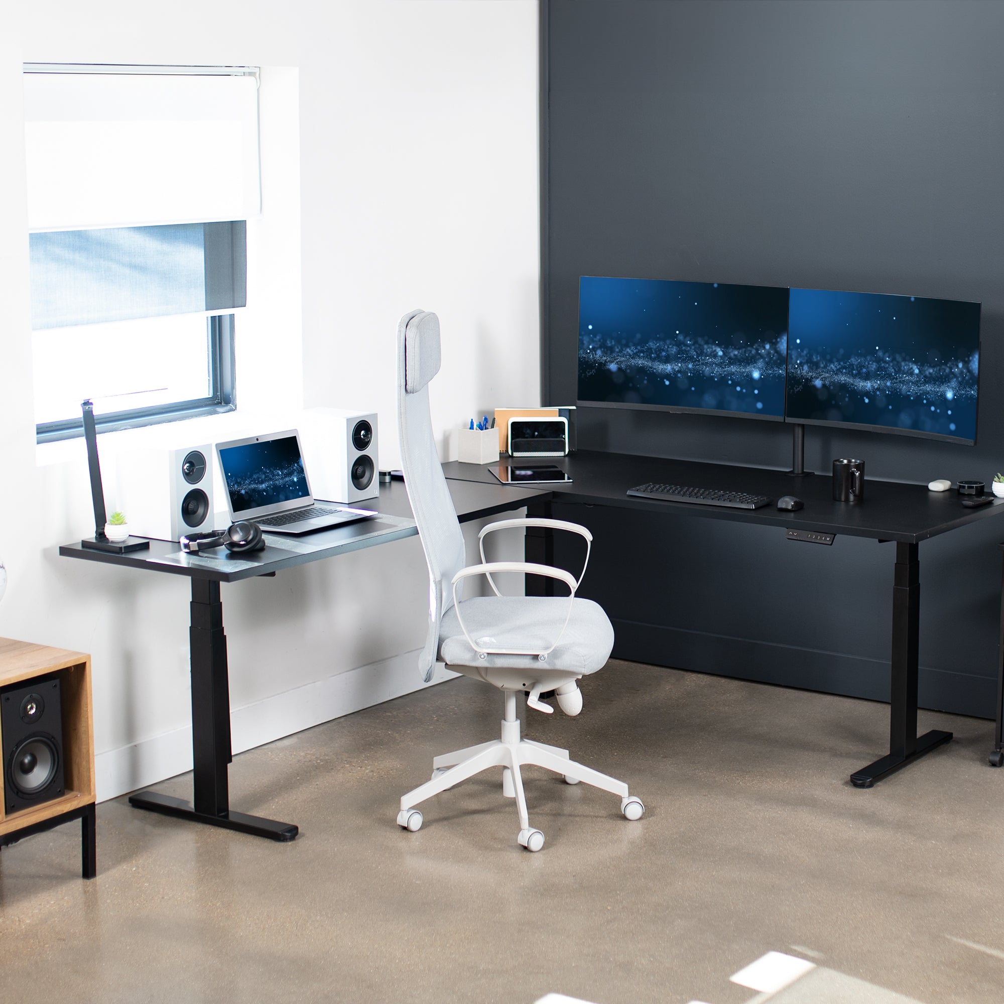 Extra large electric heavy-duty corner desk workstation for modern office workspaces.