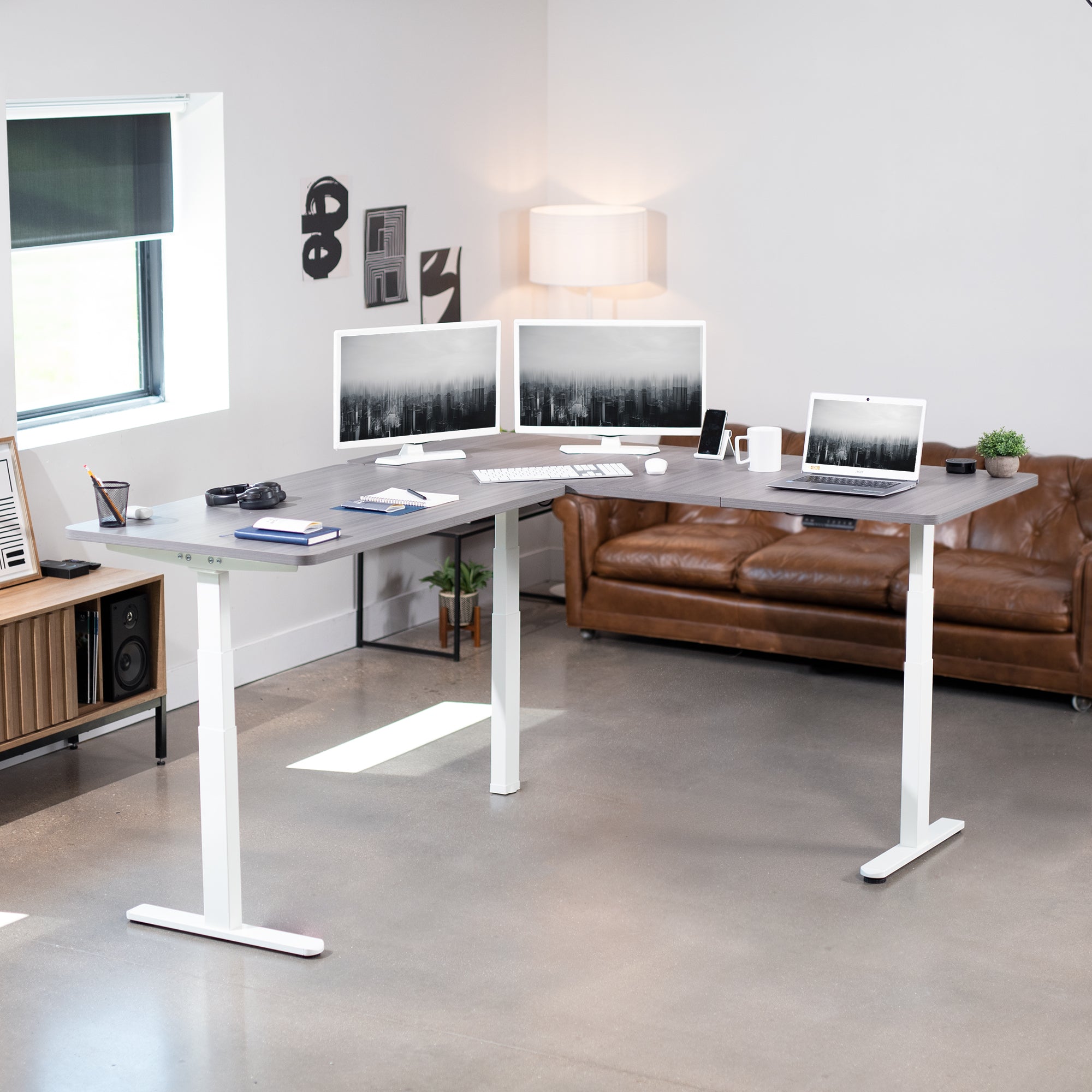 Enjoy a spacious workstation that accommodates an active work life with the Corner 77" x 71" Electric Desk