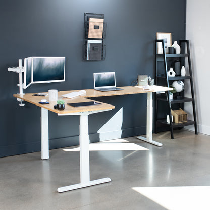 Large sturdy height adjustable bamboo corner desk workstation with memory controller.