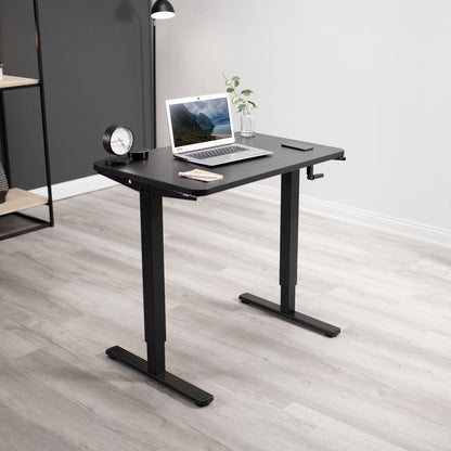 Manual hand crank height adjustable desk for active sit to stand workstation.