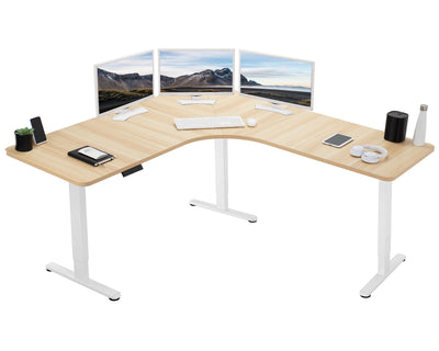 Large heavy-duty electric height adjustable corner desk workstation with programmable memory controller.