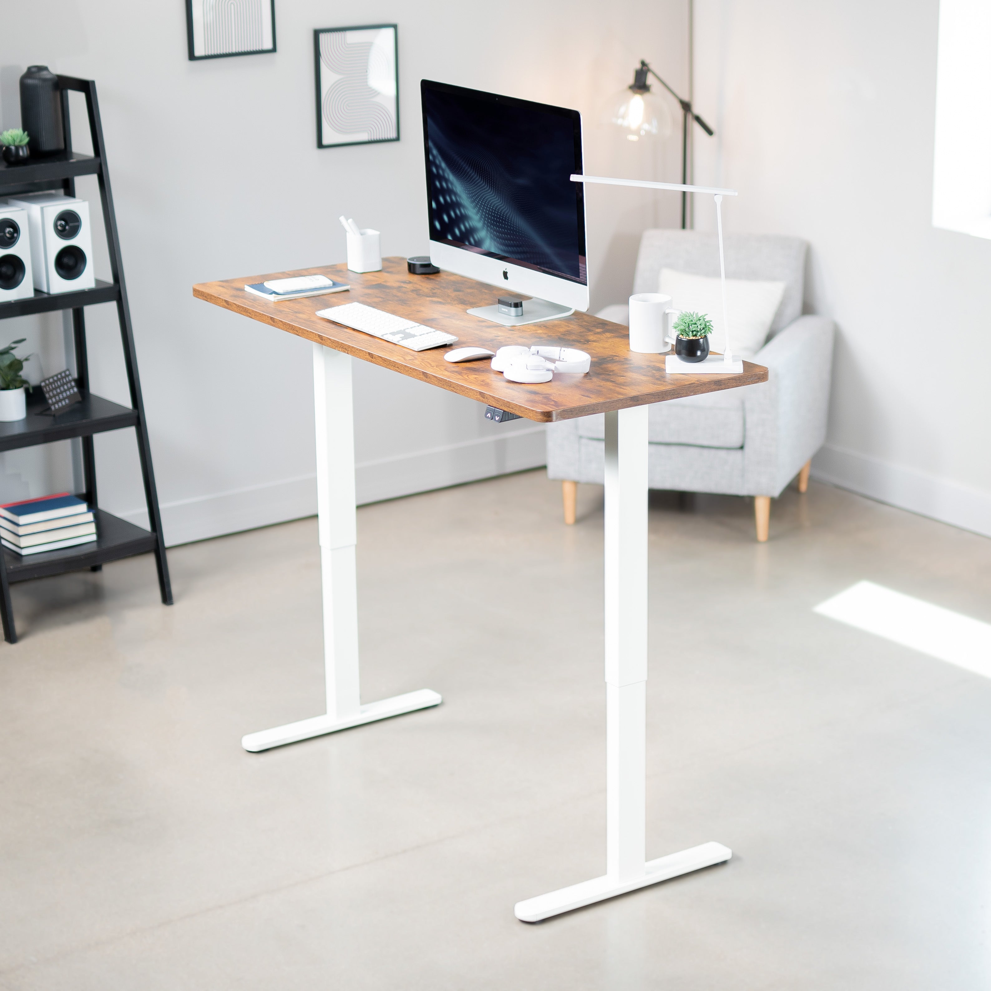 Heavy-duty rustic electric height adjustable desktop workstation for active sit or stand efficient workspace.