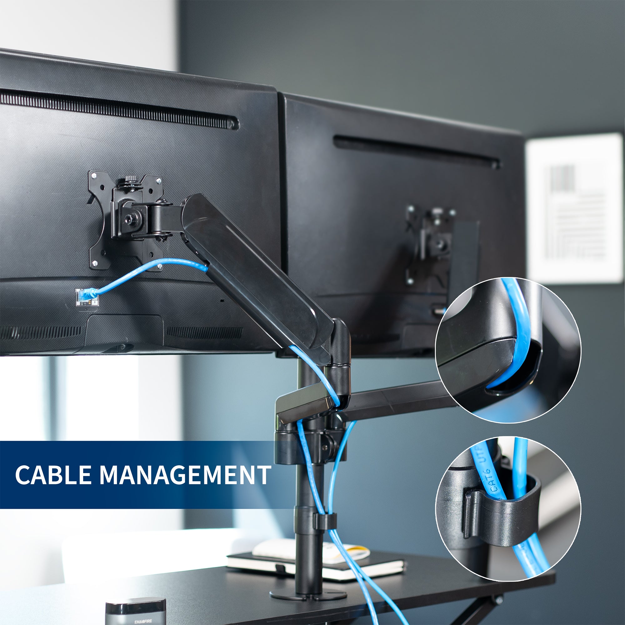 36 inch height adjustable desk riser with articulating pneumatic dual monitor mount.