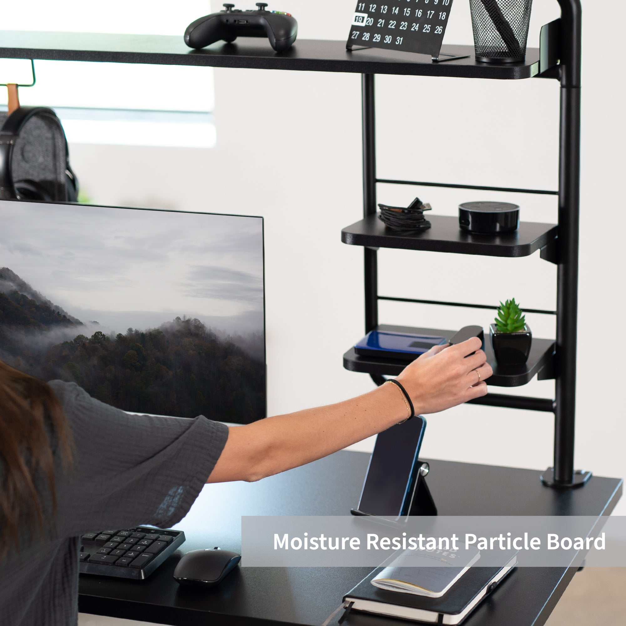 Clamp-on Desktop Shelving System for organizing office workspaces.