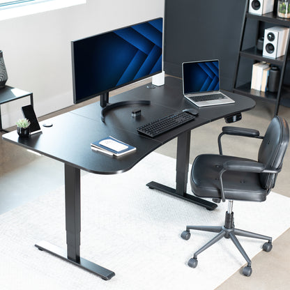 Sleek home office setup with black tabletop and black desk frame. 