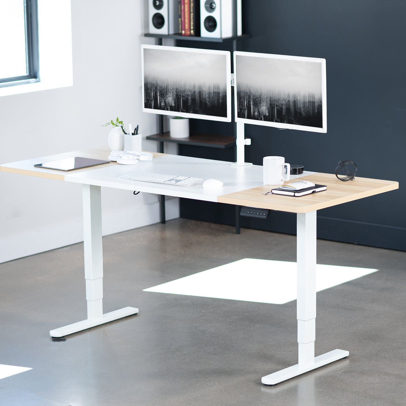 Durable sit to stand desk tabletop workstation with wide surface space.