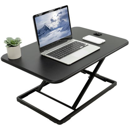 Heavy-duty height adjustable desk converter monitor riser.