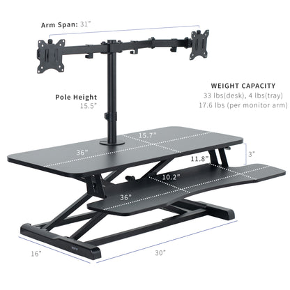 Sturdy height adjustable desk converter with articulating dual monitor mount.