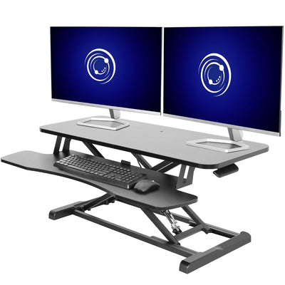 Modern black sit to stand ergonomic desk top riser.