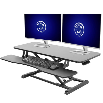 Sturdy height adjustable 2-tiered desk riser for ergonomic office workstation.