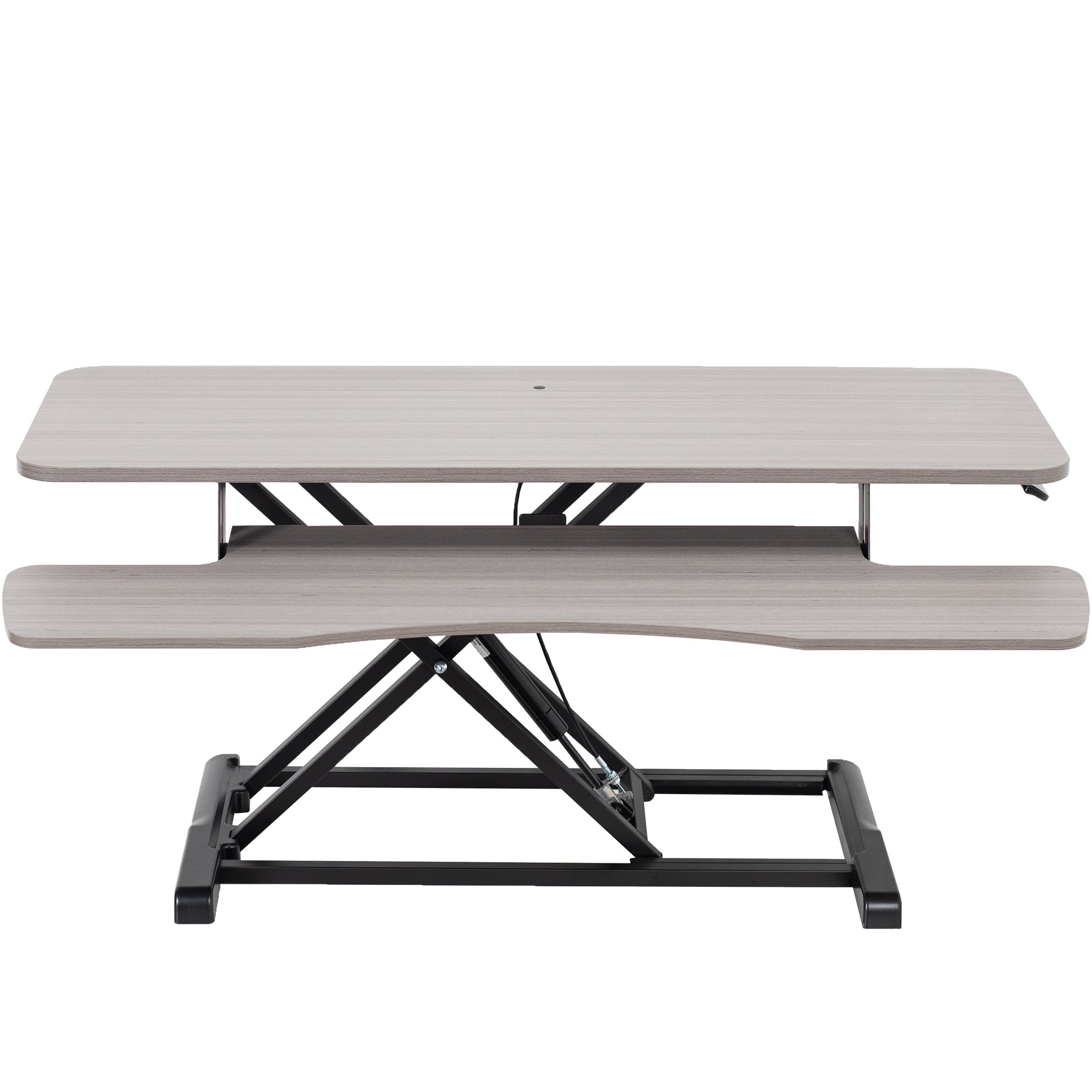 Sturdy height adjustable 2-tiered desk riser for ergonomic office workstation.