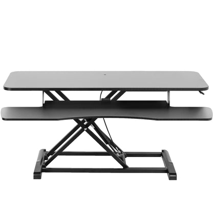 Sturdy height adjustable 2-tiered desk riser for ergonomic office workstation.