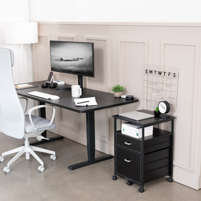 Heavy duty mobile filing cabinet with locking casters and anti-tip wheel.