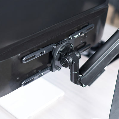 Close up of a VESA adapter used on a monitor mount