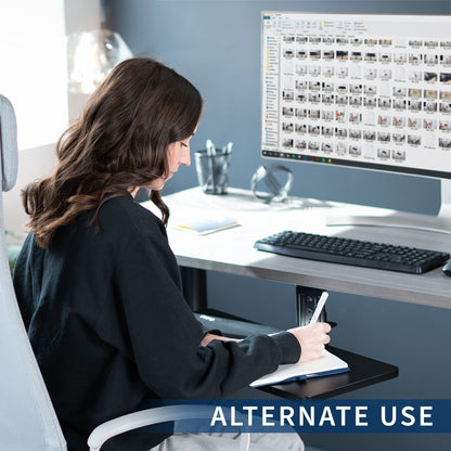 Low-profile under desk keyboard tray with 360-degree rotation.