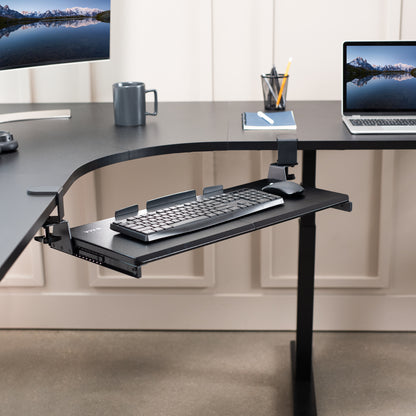 Under desk corner keyboard tray platform with adjustable swivel clamps for an ergonomic workspace.