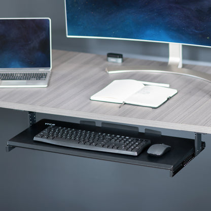 Under desk height adjustable pull-out sliding keyboard tray.