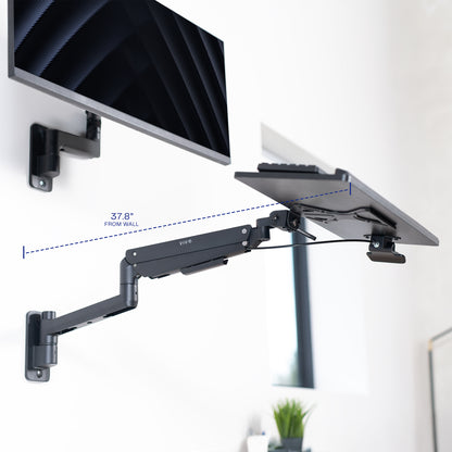 Wall-mounted monitor and  keyboard tray holder with adjustable arm on a white background