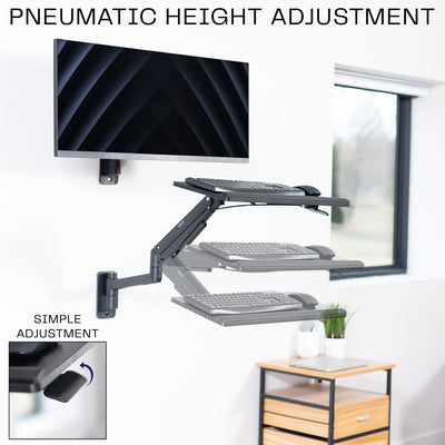 A wall mounted keyboard tray with a pneumatic mechanism and height adjustment feature. 