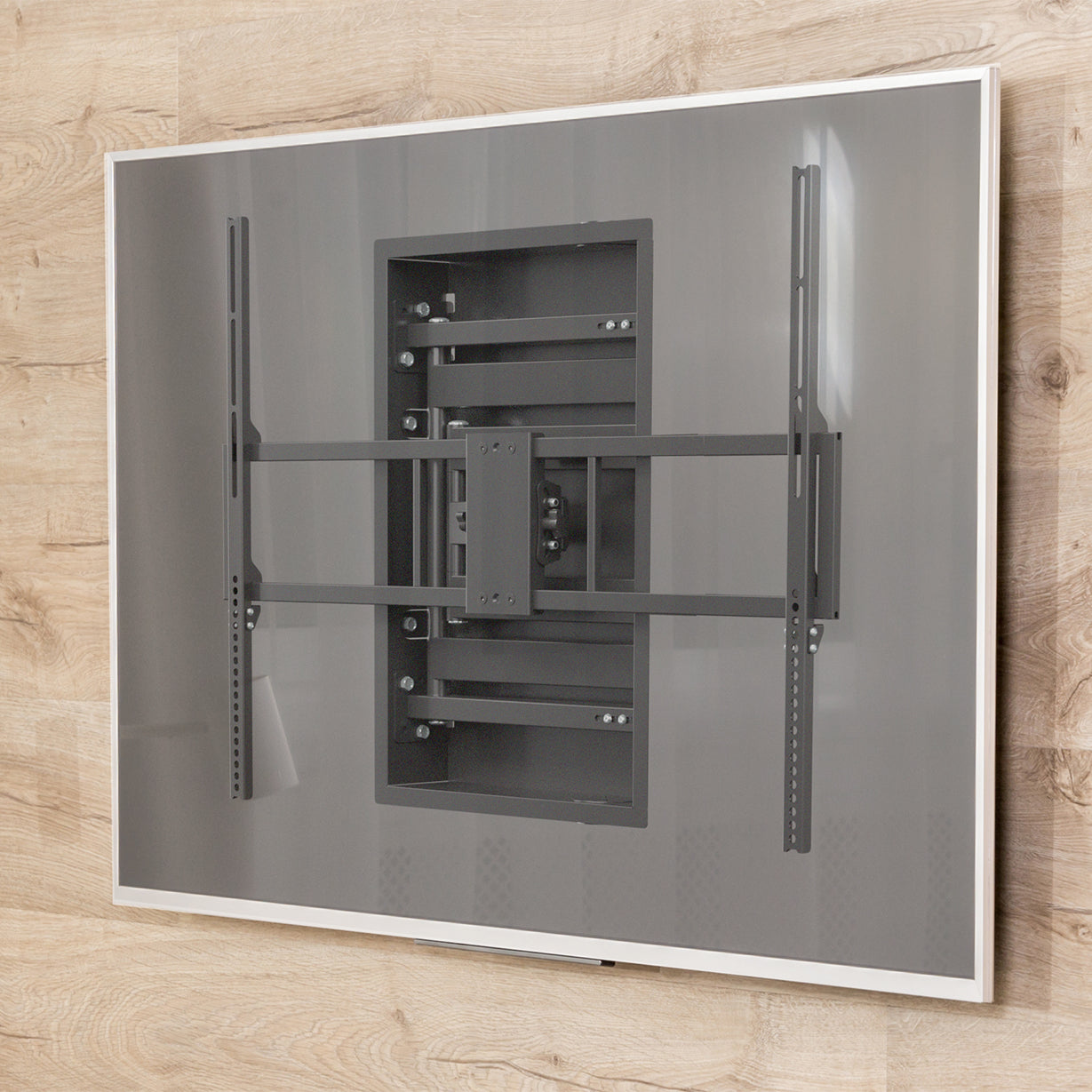 Recessed TV wall mount with extension arm.