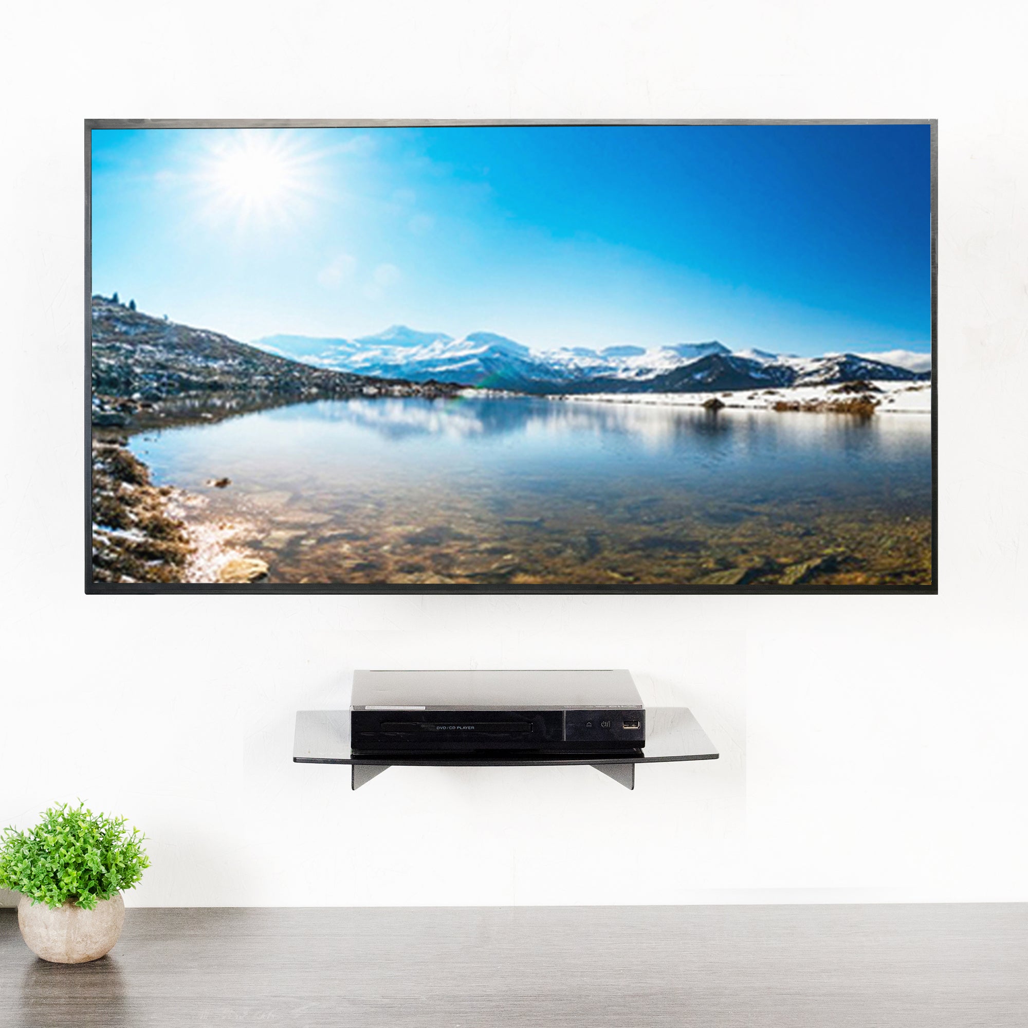 Modern floating shelf below a TV.