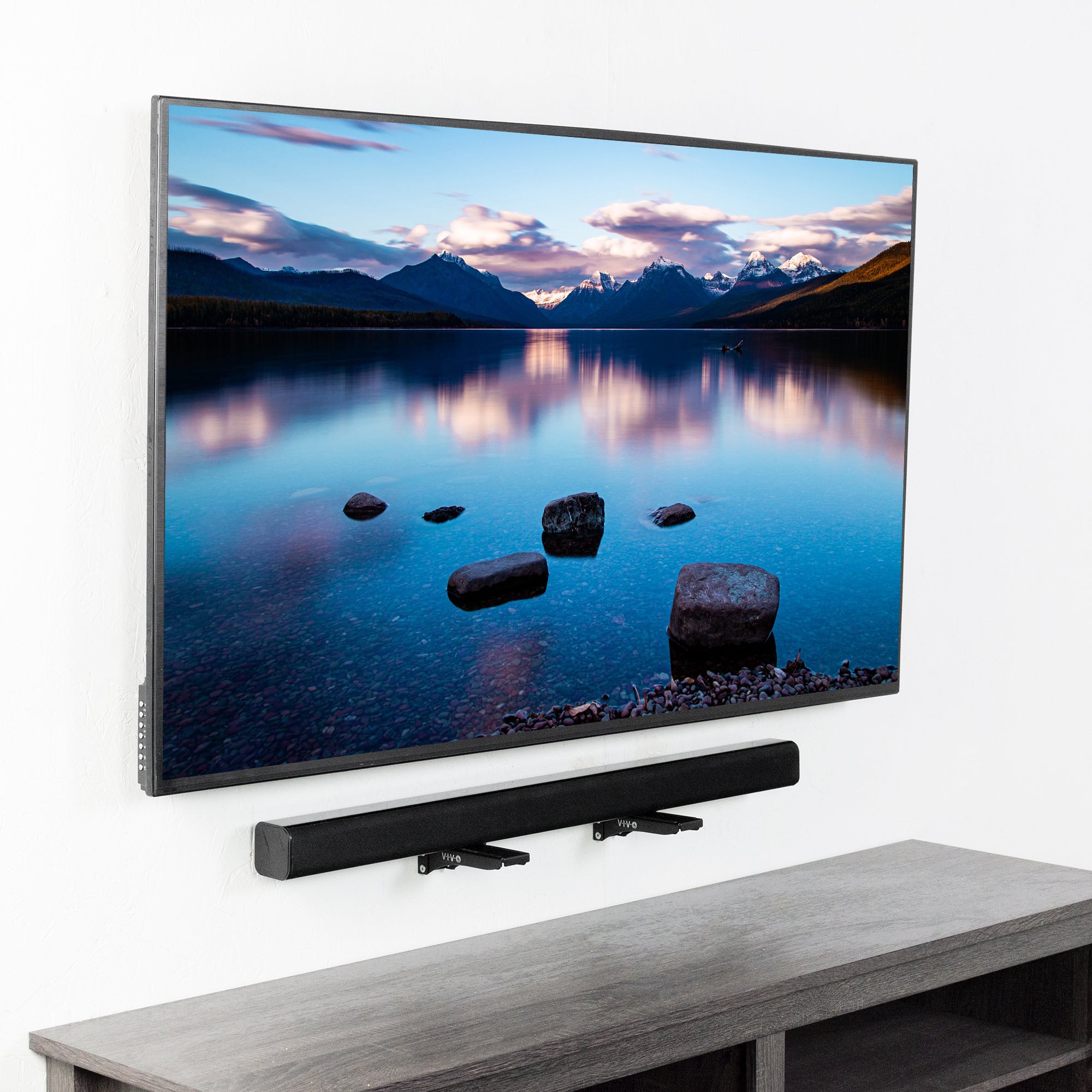 Soundbar brackets attached to the wall for a floating soundbar look.