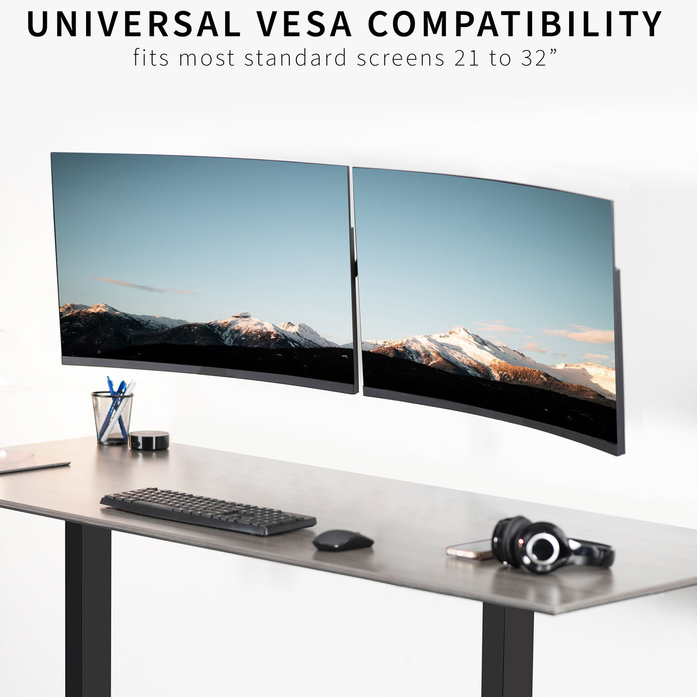 Adjustable telescoping dual monitor wall mount with universal VESA compatibility.