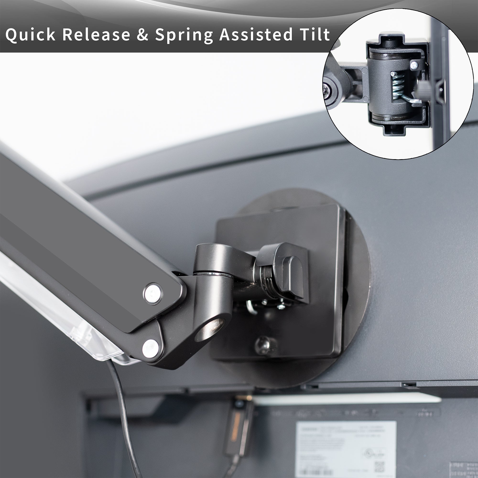 Quick release VESA plate with spring assisted tilt joint