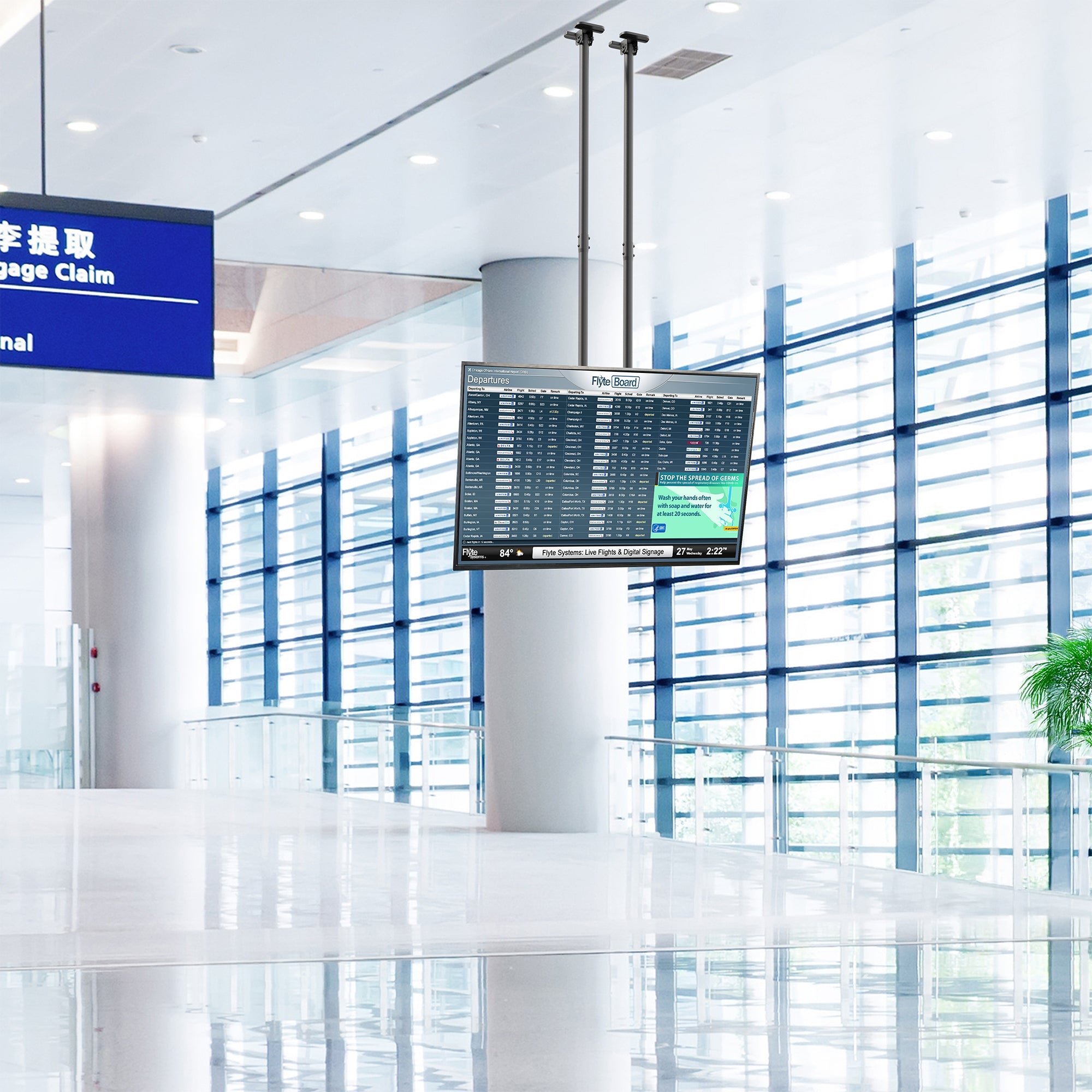 Airport terminal with digital display board hanging from a TV Ceiling mount 