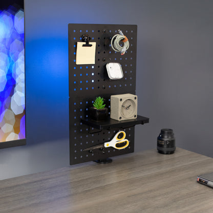 Clamp-on desk pegboard panel for privacy, decoration, and storage.
