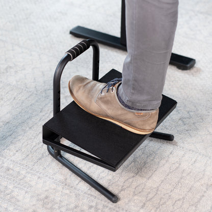 Adjustable footrest designed for workers who sit or stand all day with little ergonomic support.