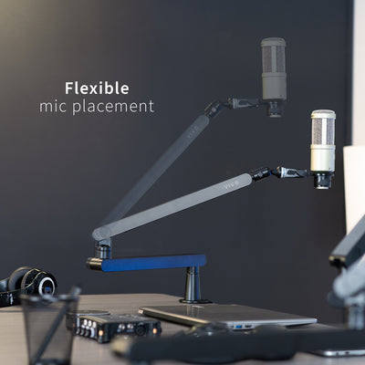 Low height adjustable clamp-on microphone arm desk mount.
