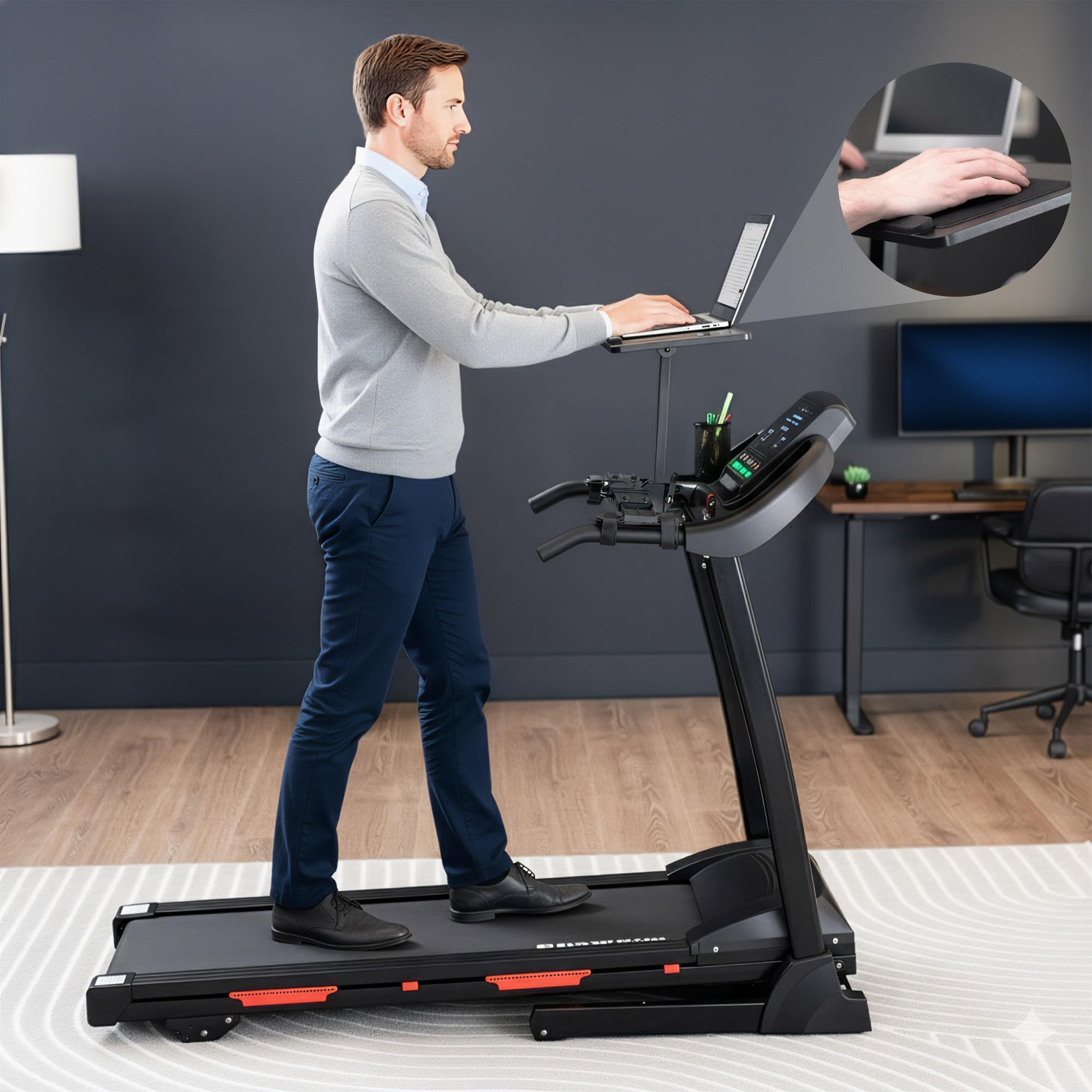 Man using a treadmill desk, typing while wallking in a home office setting.