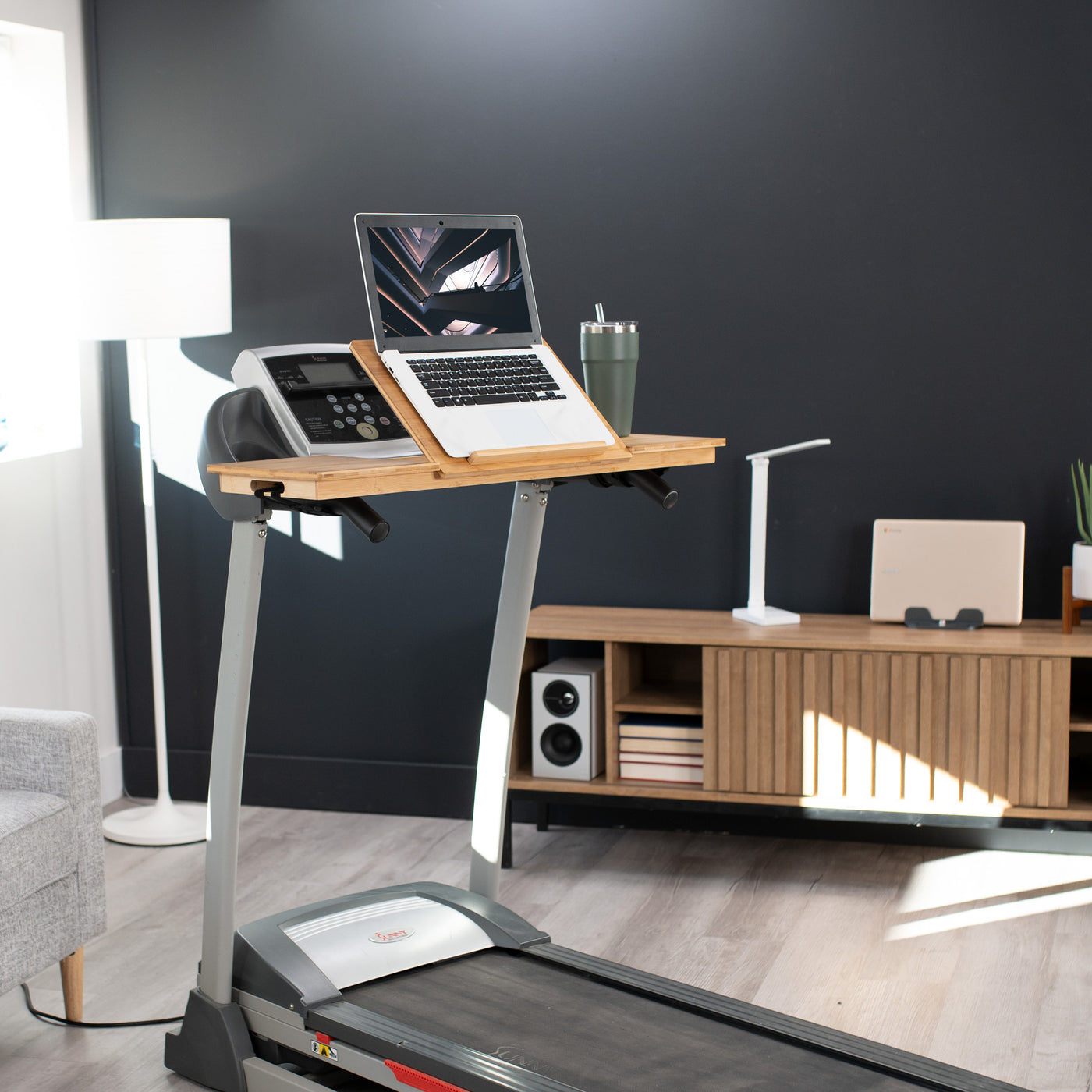 Bamboo tilting laptop desk for treadmill with heavy duty side shelves and easy installation.