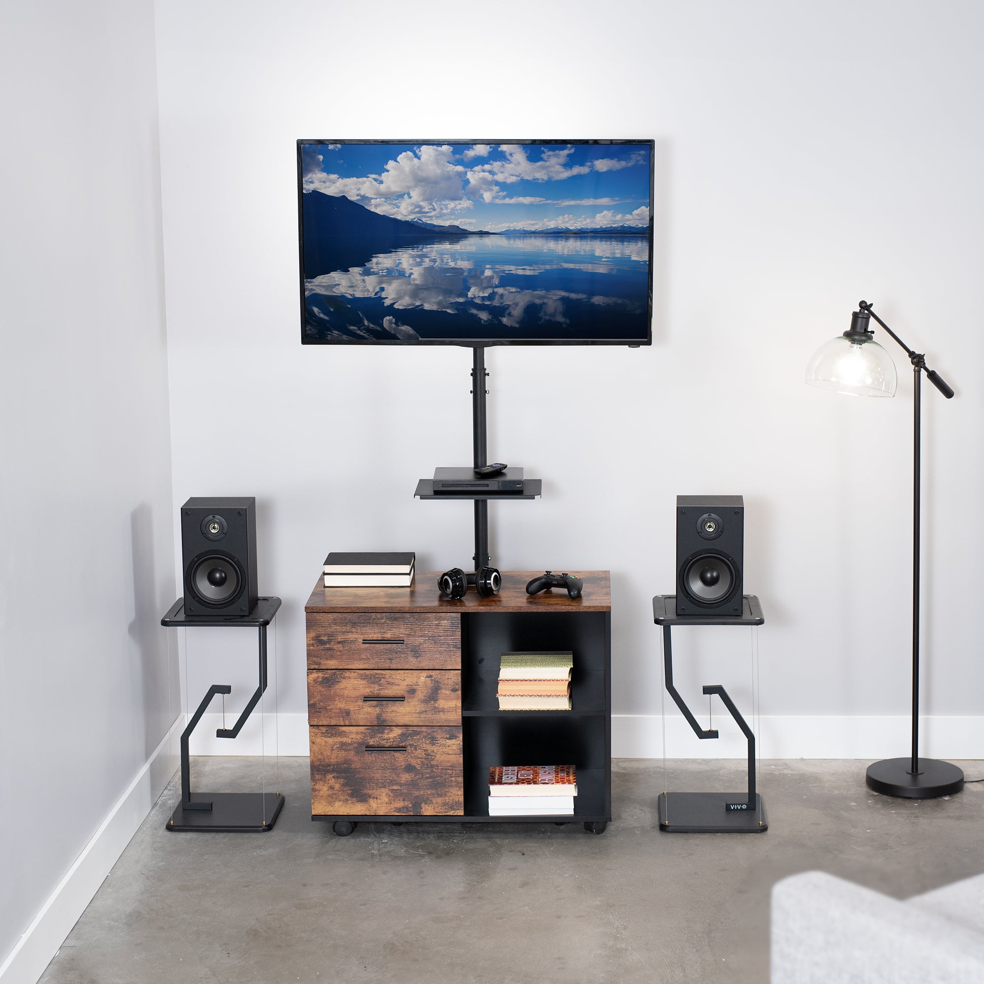 Extra tall tilting height adjustable TV stand with media shelf.