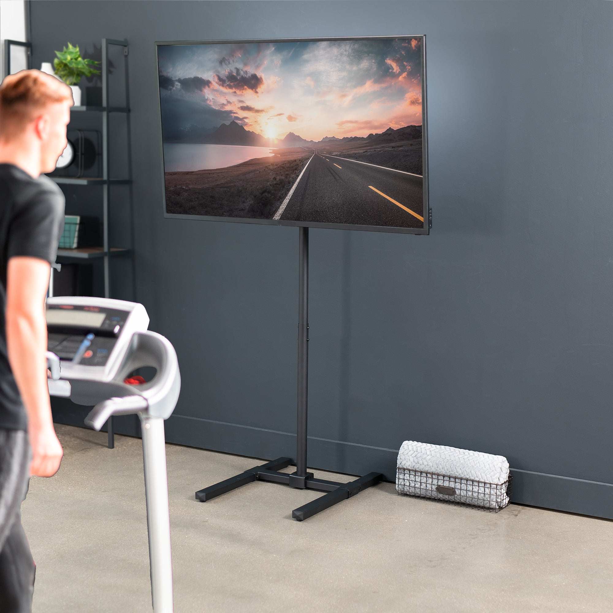 Height adjustable TV stand.