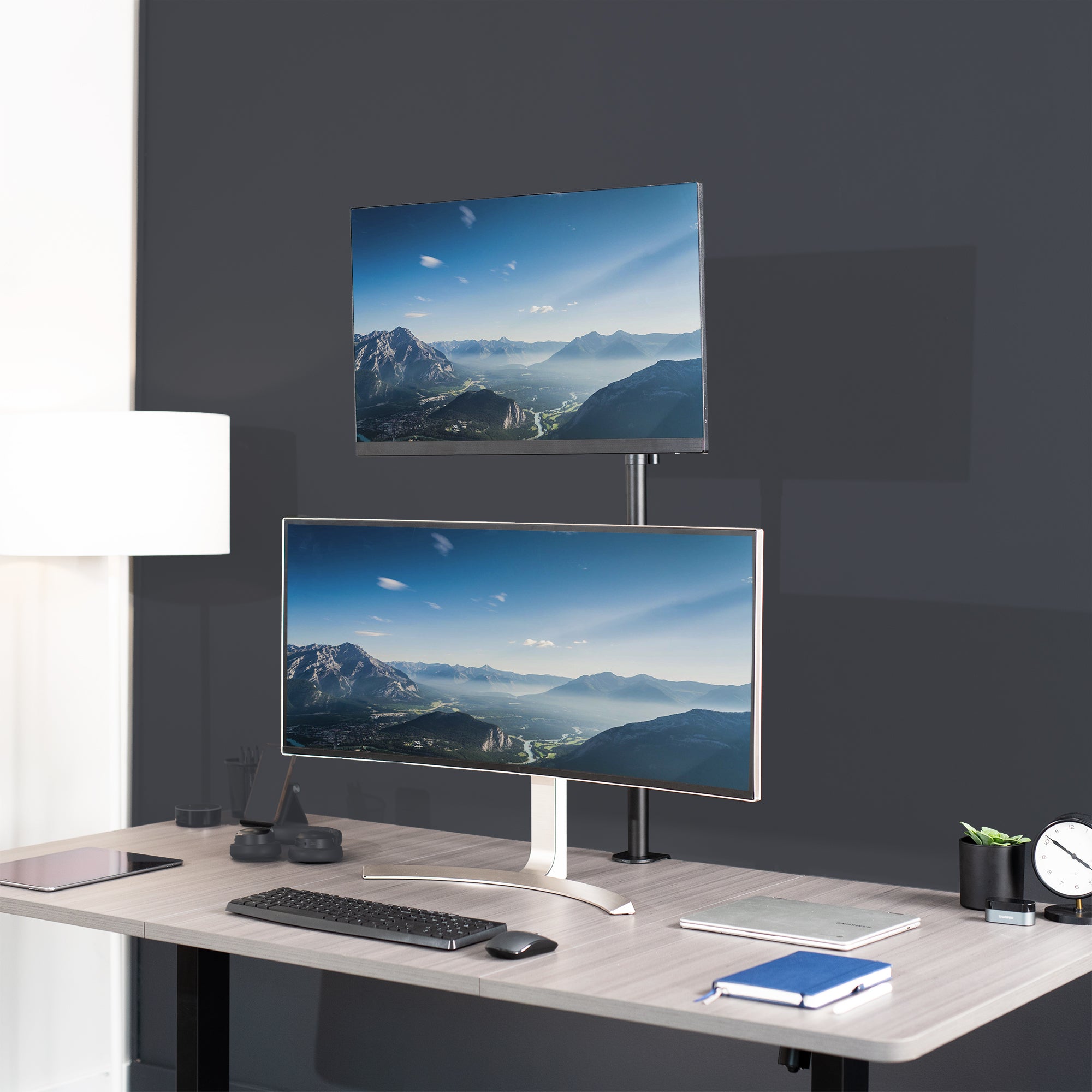 Extra tall desk mount for single monitor provides sit or stand application for the user, flexible viewing angles, and tall screen placement.