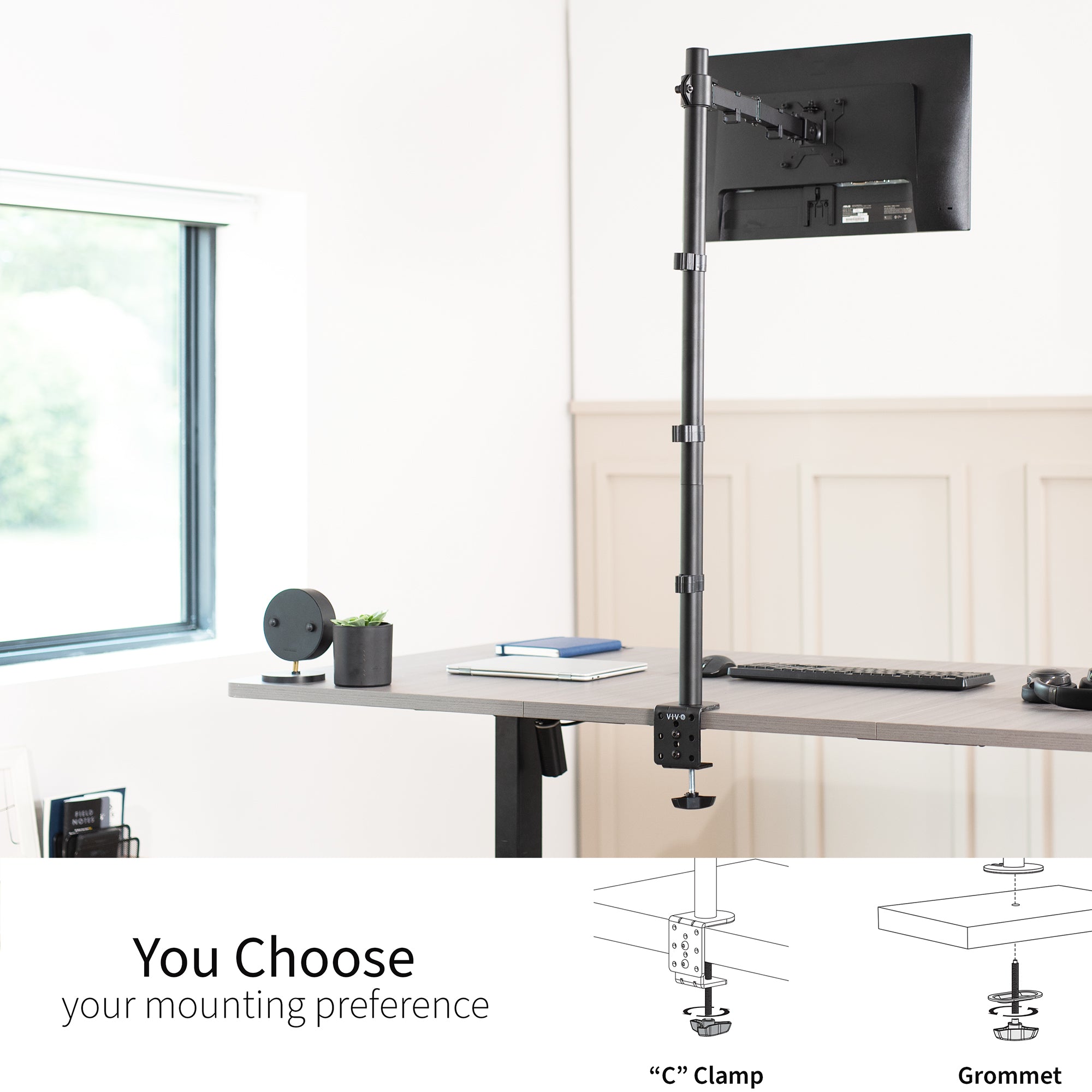 Extra tall desk mount for single monitor provides sit or stand application for the user.