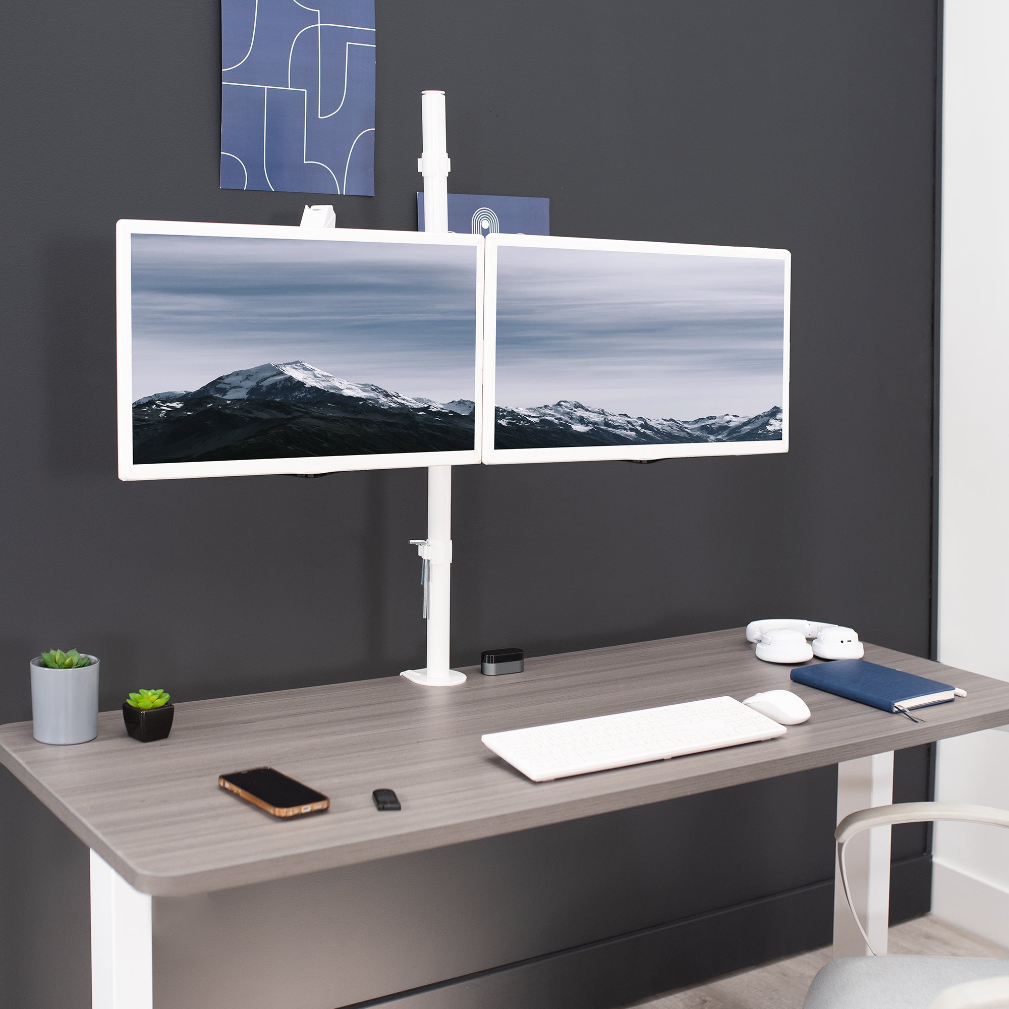 Sturdy pneumatic arm dual monitor extra tall desk mount.