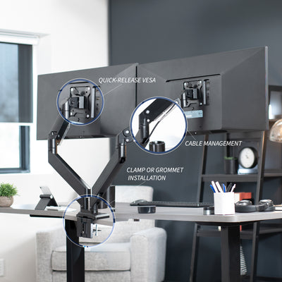 Adjustable pneumatic dual monitor desk mount for ultrawide monitors.