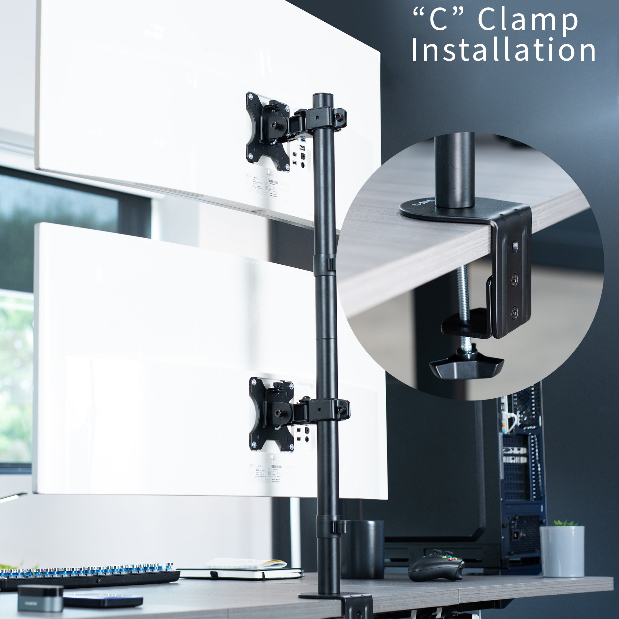 Dual Ultrawide Vertical Monitor Desk Mount elevates 2 large screens in a vertically stacked array to save desk space and create comfortable viewing angles.