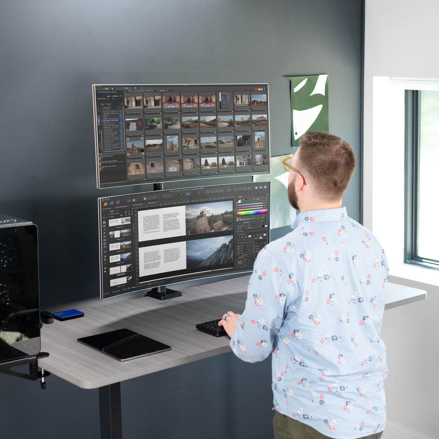 Dual Ultrawide Vertical Monitor Desk Mount in a stacked array elevates 2 large screens to a comfortable viewing angle and saves desk space.