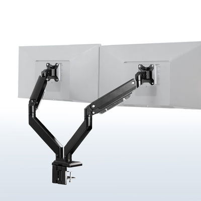 Adjustable pneumatic dual monitor desk mount for ultrawide monitors.