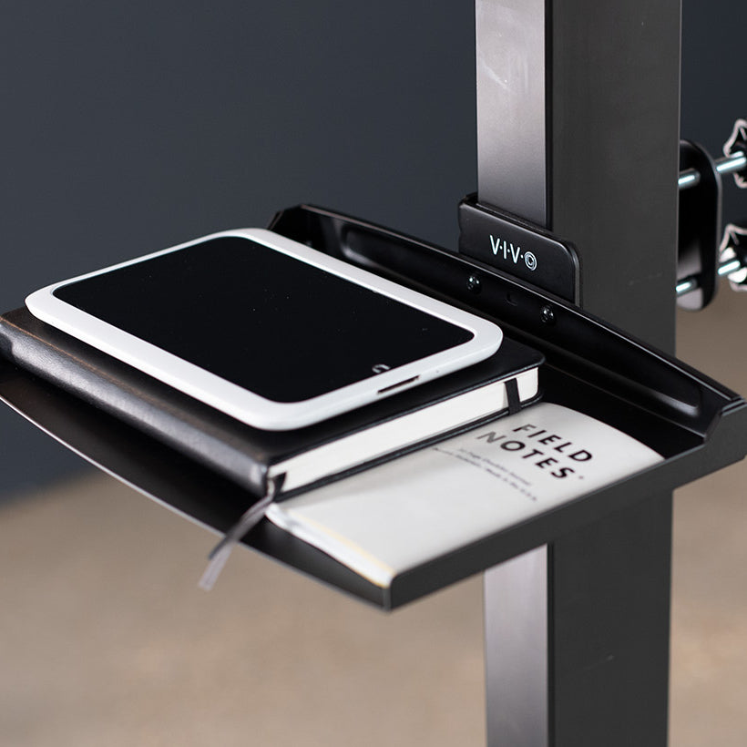 Space saving clamp on storage tray from VIVO.