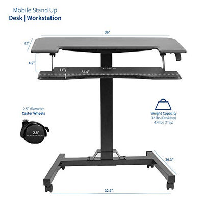 Black mobile desk with dual tire table top and caster wheels.